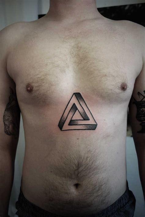 Penrose Triangle Tattoo On The Sternum