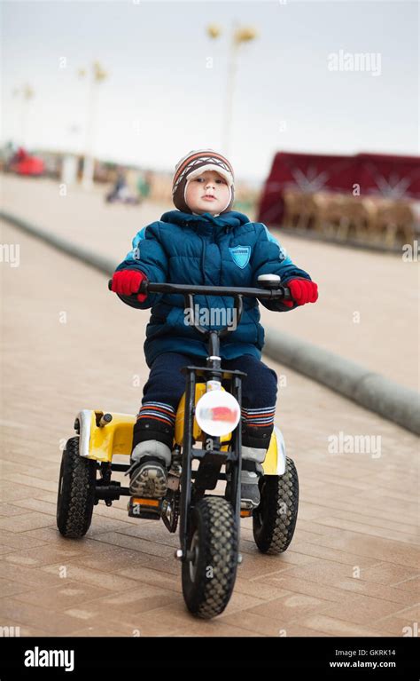 Boy On Tricycle Stock Photo Alamy