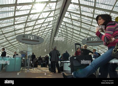 Passengers Waiting At Charles De Gaulle Airport Paris France Europe