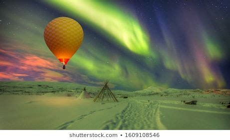 Hot air balloon flying with spectacular Northern lights - Northern