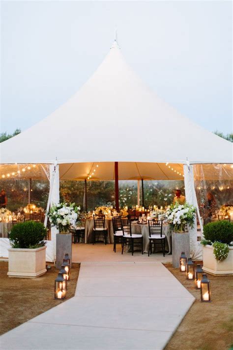 minimalist tent wedding with wooden accents and floral | Wedding tent