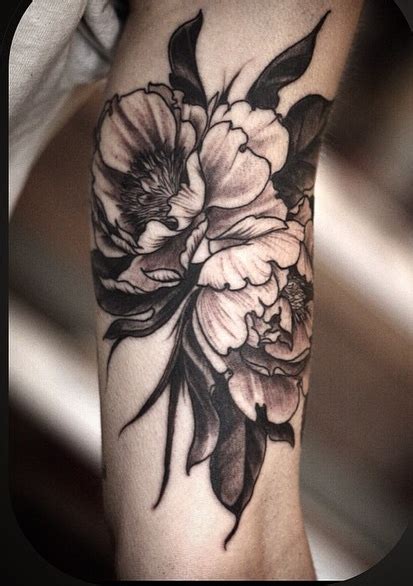 Even the horrifying themes with skeletons and weird creatures have a strange beauty that is unmistakable. black ink flower tattoo by Alice Kendall - Design of ...