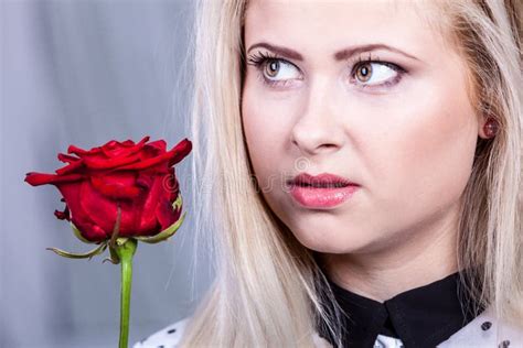 Beautiful Blonde Woman Holding Red Rose Stock Image Image Of Thinking Attractive 82887371