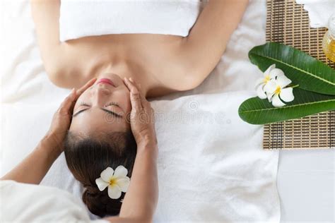 Happy Asian Woman Receiving Head Massage Enjoying And Relaxing In Spa Salon Stock Image Image