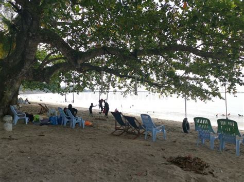 Leisure Activities Of People Relaxing On The Exotic Beach Editorial