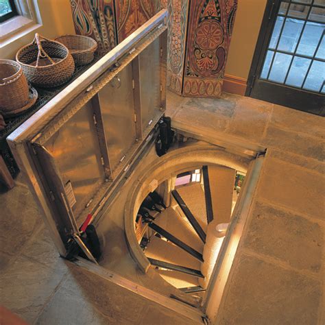 The staircase door is designed to operate with either straight or l shaped flights of stairs. Trap Door Wine Cellar Designs
