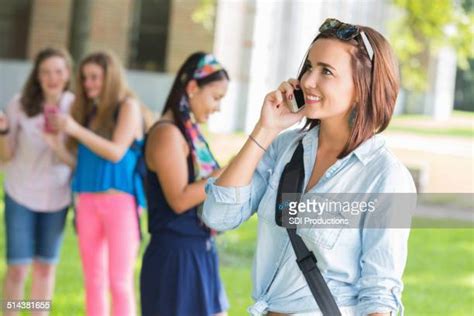 Cute Female Students Walking On Sunny College Campus Photos And Premium