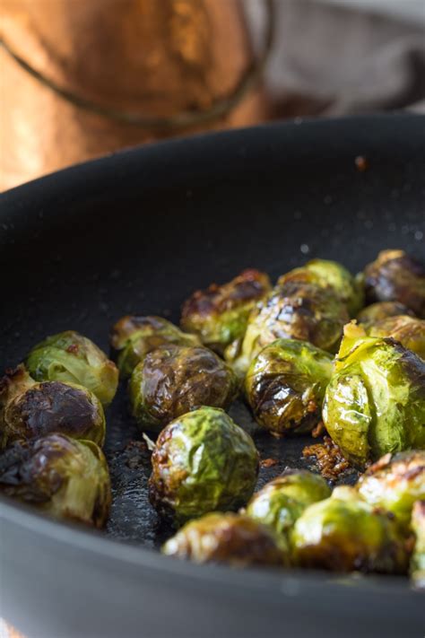Roasting brussels whole turns them into little balls of magic. Easy Garlic Roasted Brussels Sprouts | Lauren Caris Cooks