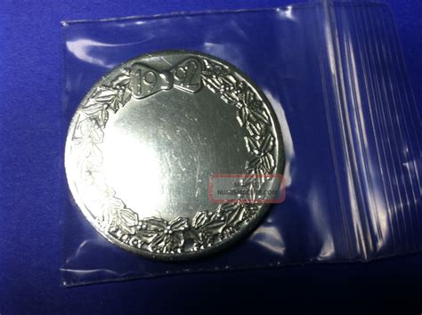 One troy ounce uss wisconsin bb 64 decommissioning commemorative.999 fine silver. 1992 Christmas " Santa Clause " Engravible 1 Troy Oz. 999 ...