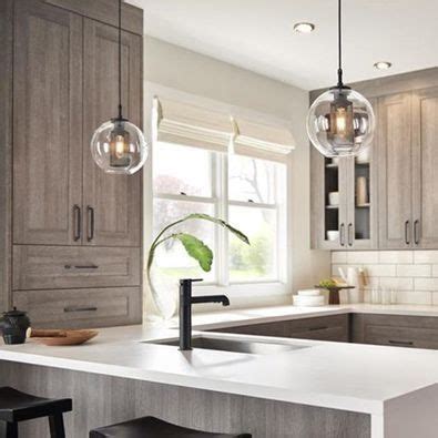 Sep 28, 2020 · whether it's pendants over your countertop or a chandelier over your dining table, it's important to get the spacing and sizing right so that the room feels balanced. Pendant Lighting Buying Guide Pendulum Lights For Kitchen ...