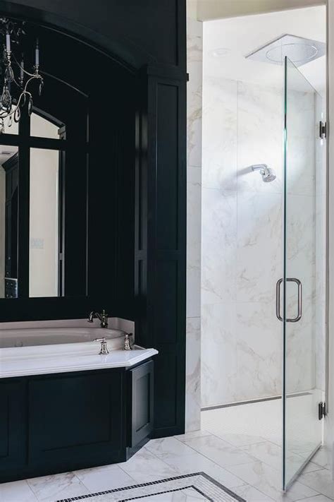 Black marble walk in shower. A walk in shower fitted with a marble shower surround ...