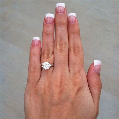 360° hd video of every diamond & ring. My beautiful engagement ring. 2 carat solitaire diamond on a white gold band :) My fiancé did an ...