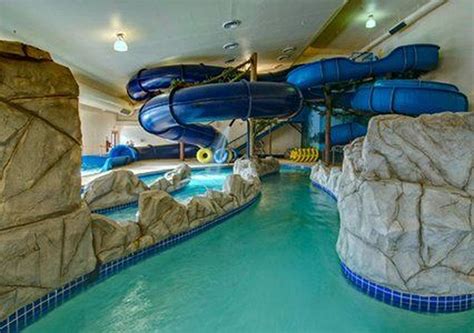 20 Awesome Indoor Swimming Pool Designs With Slide Indoor Swimming