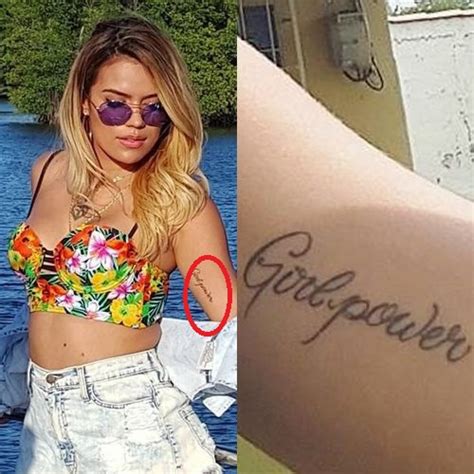 And if they're dating—which all signs point to yes—the numbers prove they are music royalty. Karol G's 9 Tattoos & Their Meanings - Body Art Guru
