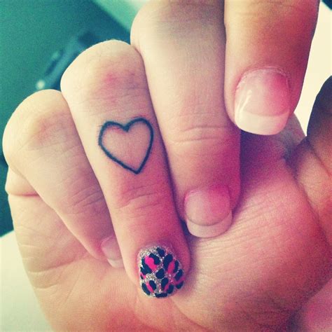 Touch device users can explore by touch or with swipe gestures. Heart finger tattoo | Tatted. | Pinterest