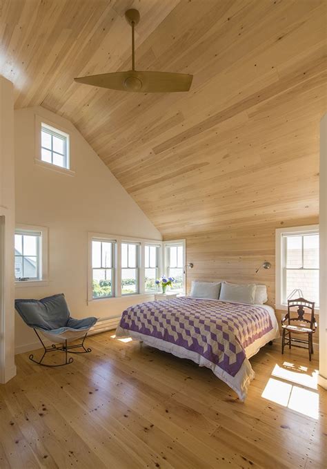 Building beautiful homes & cabins to meet every budget. master bedroom, fan, wood ceilings, corner windows, knotty ...