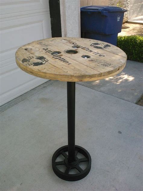 Pub tables can be either square or round, but the traditional shape is round; Pin by Shana Miles on DIY | Recycled home decor, Spool furniture, Pub table