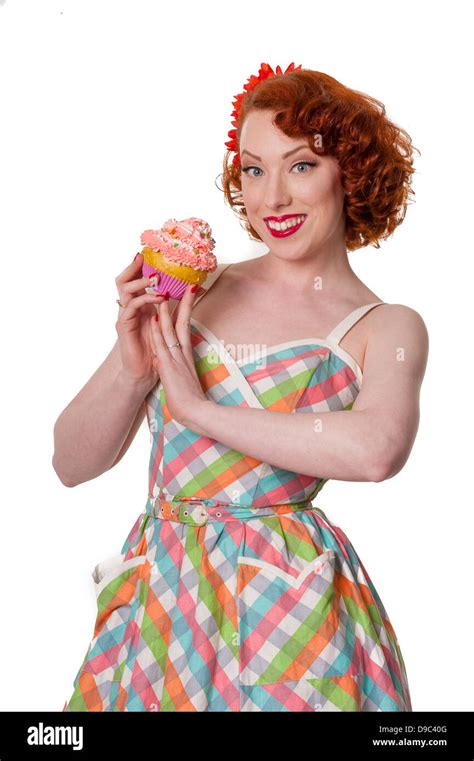 Happy Retro Fifties Redhead Female Holding Cupcake Isolated On White