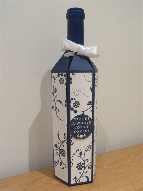 Make this cute mini wine box for someone today! CraftyCarolineCreates: Wine Bottle Gift Box Tutorial ...