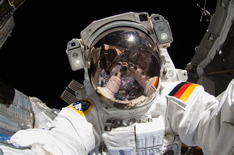 Astronaut Taking Selfie At Space Hd Wallpaper Wallpaper Flare