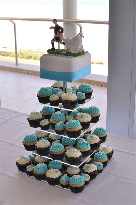 Photos of gorgeous beach theme wedding cakes! Beach themed aqua blue wedding cupcakes | White choc mud ...