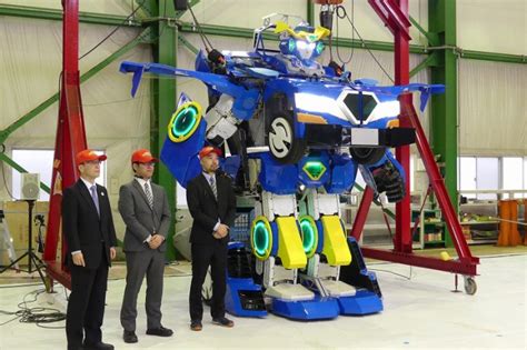 Japan Engineers Create Robot That Transforms Into Car With Men On Board
