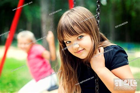 Babe Girl Smiling On Swing Stock Photo Picture And Low Budget Royalty Free Image Pic ESY