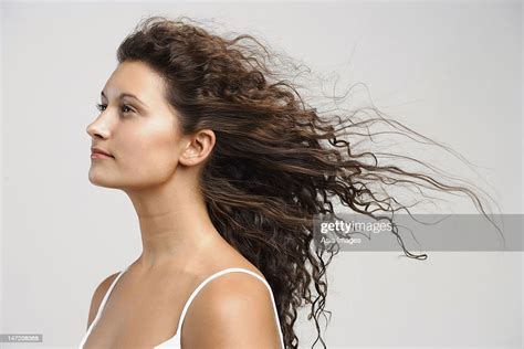 Woman With Wind Blowing In Face Eyes Open Photo Getty Images