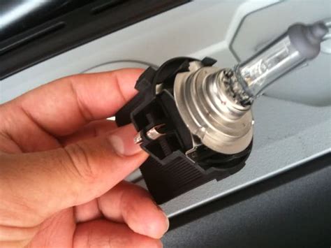 How To Change Headlight Bulb On A Ford Kuga Car Ownership Autotrader