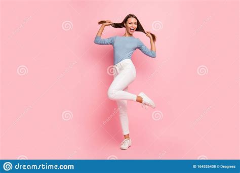 full length body size photo of cheerful positive cute pretty girl showing her healthy hair