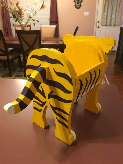 Only 2 available and it's in 2 people's carts. LSU Tiger Animal Planter. Wooden Garden Decorations ...