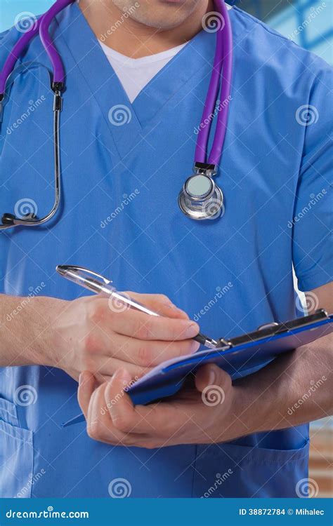 A Doctor Writing In Clipboard Stock Photo Image Of Stethoscope Blue