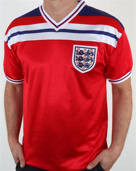 Check out our england shirt selection for the very best in unique or custom, handmade pieces from our sports & fitness shops. 80s Casual Classics England 1982 Retro Football Away Shirt ...