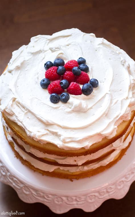 This Lemon Naked Cake Is Layered With A Whipped Cream Cheese Frosting