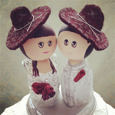 The bride and groom stand there innocently; DSMeeBee: Indian Bride and Mexican Groom Wedding Cake Toppers