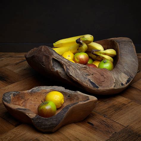 hand carved wooden bowl by the original home store | notonthehighstreet.com