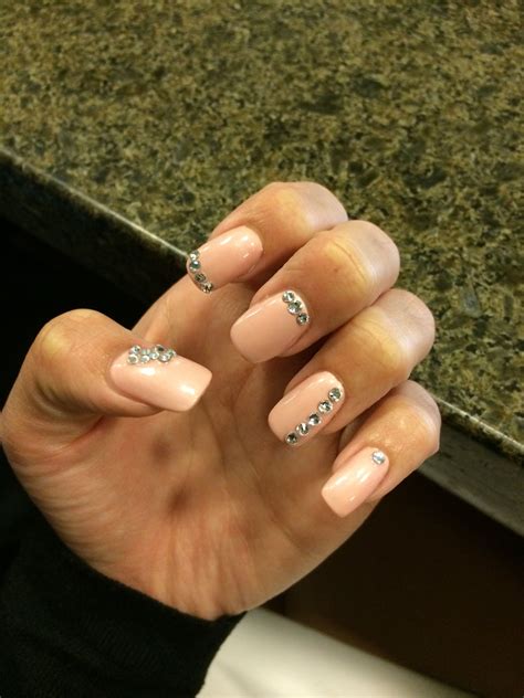 Full Set Acrylic With Nude Gel Nail Polish And Gems Nails Pinterest