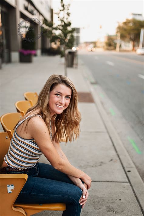 Unique Senior Girl Poses City Urban Outdoors Sitting Arm