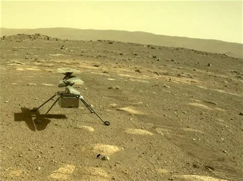 Nasas Mars Helicopter Ingenuity Took Its First Aerial Color Photos Of