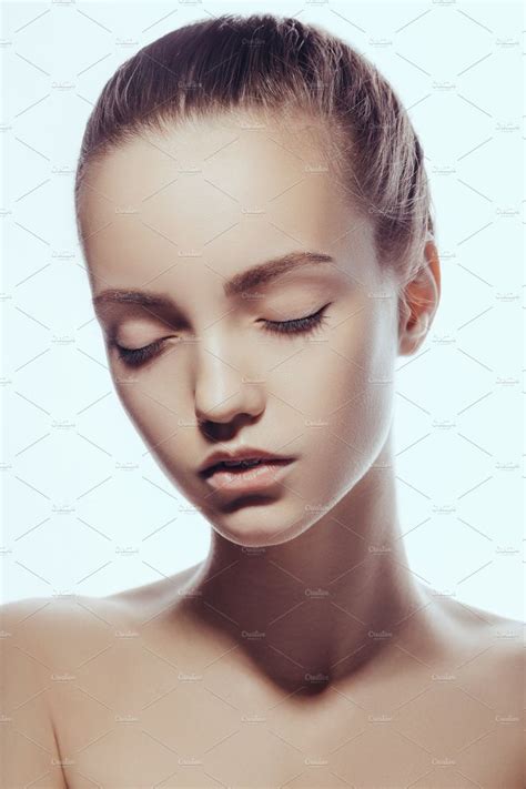 Front Portrait Of Beautiful Face With Beautiful Closed Eyes Isolated On White By Buyanskyy On