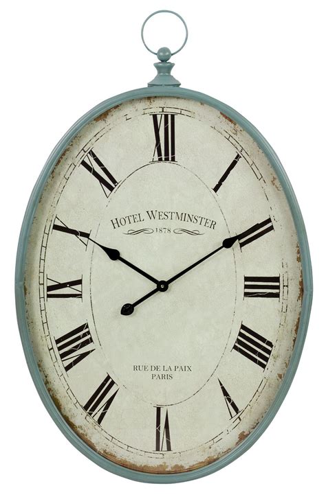 Sonia Oval Wall Clock | Metal wall clock, Wall clock, Clock
