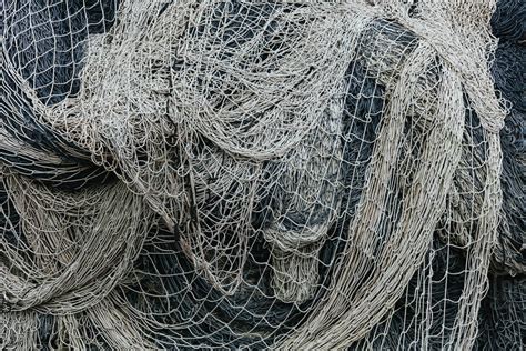 Pile Of Commercial Fishing Nets And Gill Nets On A Fishing Quay