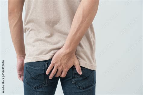 Abdominal And Hemorrhoids Male Hand Holding Her Bottom Because Having Pain Health Care