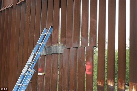 Border Officials Repair Garage Sized Hole Cut Into Arizona Mexico Fence