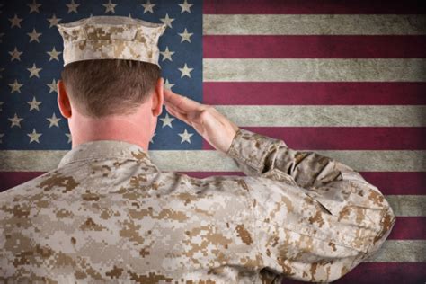 Marine Salutes An American Flag Stock Photo Download Image Now Istock