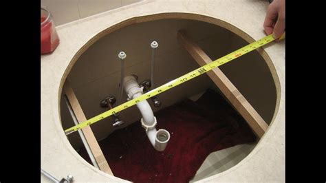 Measure the dimensions of the old bathroom sink with a measuring tape. How to Install a Drop-In Bathroom Sink - YouTube