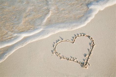 Heart In Sand Stock Photos Pictures And Royalty Free Images Istock