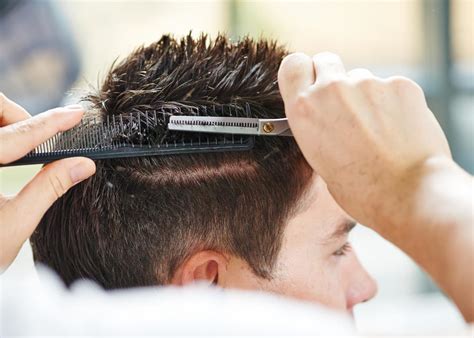 A haircut is a receiving a completely different style or cutting off several inches of one's hair. A woman wants a men's haircut in the South.