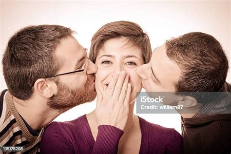 Two Men Kissing A Woman Stock Photo Download Image Now 20 24 Years