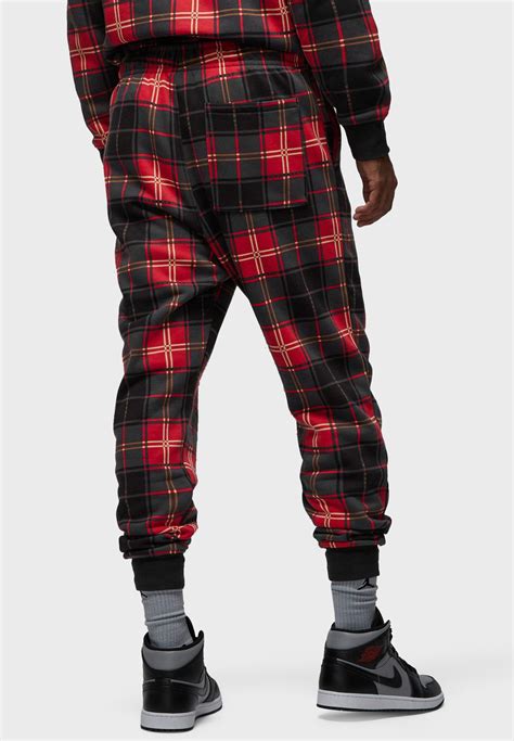 Buy Jordan Red Jordan Essential Holiday Fleece Sweatpants For Kids In